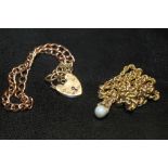 A 9CT GOLD SOLITARY PEARL NECKLACE PLUS A 9CT GOLD HEART LOCK ON BRACELET