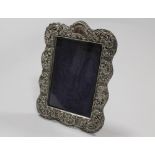 AN ANTIQUE HALLMARKED SILVER PICTURE FRAME