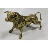 A LARGE HEAVY BRASS BULL