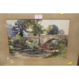 A FRAMED AND GLAZED WATERCOLOUR OF A RIVER SCENE SIGNED J E HENNAH