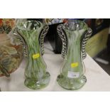 A PAIR OF GREEN VASELINE GLASS VASES