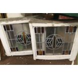 TWO LARGE STAINED GLASS WINDOWS IN FRAMES