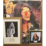 A FRAMED BLACK AND WHITE PHOTOGRAPH OF JANIS JOPLIN WITH SEPARATE SIGNATURE BELOW, WITH CERTIFICATE