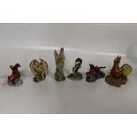 SIX VARIOUS ENCHANTICA DRAGON POLYSTONE STATUES