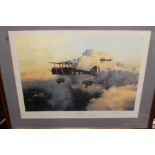 A FRAMED AND GLAZED LIMITED EDITION PRINT BY ROBERT TAYLOR 'THE DAWN PATROL', signed by Gwilym Lewi