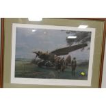 A FRAMED AND GLAZED LIMITED EDITION PRINT BY ROBERT TAYLOR 'THEY LANDED BY MOONLIGHT' SIGNED BY HUG