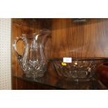 A LARGE CUT GLASS JUG AND BOWL SET