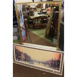 A LARGE GILT FRAMED MIRROR AND A MODERN PRINT