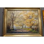 A FRAMED OIL ON CANVAS OF A COUNTRYSIDE SCENE TOGETHER WITH A FRAMED PRINT