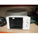 A MICROWAVE PLUS AN ELECTRIC HEATER