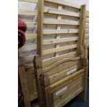 A COLONIAL PINE DOUBLE AND SINGLE BED FRAMES WITH MATTRESSES