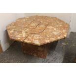 A MARBLE OCTAGONAL COFFEE TABLE