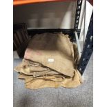 A QUANTITY OF VINTAGE HESSIAN SACKS