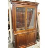 A LATE VICTORIAN PINE GLAZED BOOKCASE