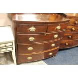 A 19TH CENTURY MAHOGANY BOW FRONTED CHEST OF FIVE DRAWERS