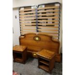 A MODERN YEW WOOD KING SIZE BED FRAME WITH A PAIR OF BEDSIDE CHESTS