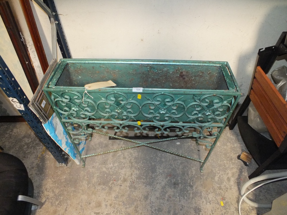 A FLOWER TROUGH IN STAND PLUS TWO WALL MOUNTABLE PLANT BASKETS