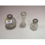 TWO HALLMARKED SILVER CUT GLASS SCENT BOTTLES TOGETHER WITH A SILVER RIMMED VASE (3)