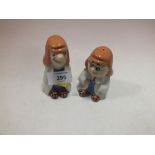 A PAIR OF WADE TETLEY TEA SALT AND PEPPER SHAKERS