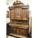 AN ANTIQUE FRENCH CARVED OAK BUFFETT