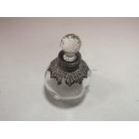 A HALLMARKED SILVER COLLARED SCENT BOTTLE WITH PIERCED FLAMING TORCH DECORATION