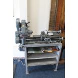 A 'MYFORD ML7' METAL WORKING LATHE, on fitted stand. In good condition but not tested. Together wit