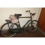 A RALEIGH BICYCLE with Sturmey Archer 4-speed gears, rod brakes, dynamo, saddle bag etc