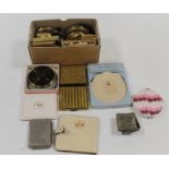 A COLLECTION OF VINTAGE POWDER COMPACTS