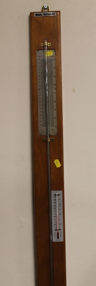 A WALL MOUNTED GRIFFIN AND GEORGE LTD. MERCURY BAROMETER AND THERMOMETER