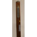A WALL MOUNTED GRIFFIN AND GEORGE LTD. MERCURY BAROMETER AND THERMOMETER