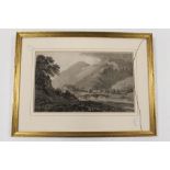 A FRAMED AND GLAZED ETCHING DEPICTING A BRIDGE OVER A RIVER IN A MOUNTAINOUS SCENE