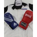 A TITLE BOXING GLOVE SIGNED BY STEVE COLLINS 'THE CELTIC WARRIOR', an Adidas boxing glove signed by