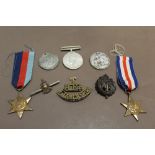 A SELECTION OF WAR MEDALS, BADGES, PINS ETC