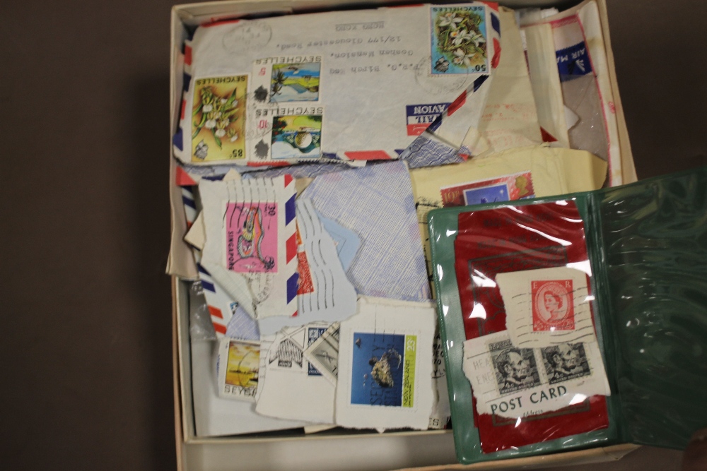 A BOX OF ASSORTED STAMPS