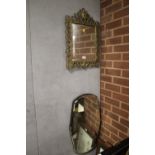 A VINTAGE BRASS FRAMED BEVEL EDGED MIRROR S/D TOGETHER WITH ANOTHER (2)
