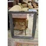 A LARGE ANTIQUE PICTURE FRAME