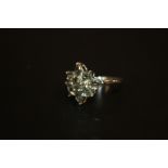 A BOXED LADIES 9 CT GOLD FLORAL STYLE CLUSTER RING