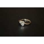 A BOXED LADIES 9CT GOLD ILLUSION SET TWIN DIAMOND RING