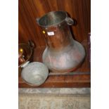 AN UNUSUAL COPPER CAULDRON TOGETHER WITH A COPPER LADLE