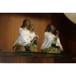 A PAIR OF CHISWICK CERAMICS SEATED RASTAFARIAN FIGURES SIGNED TO BASE A/F