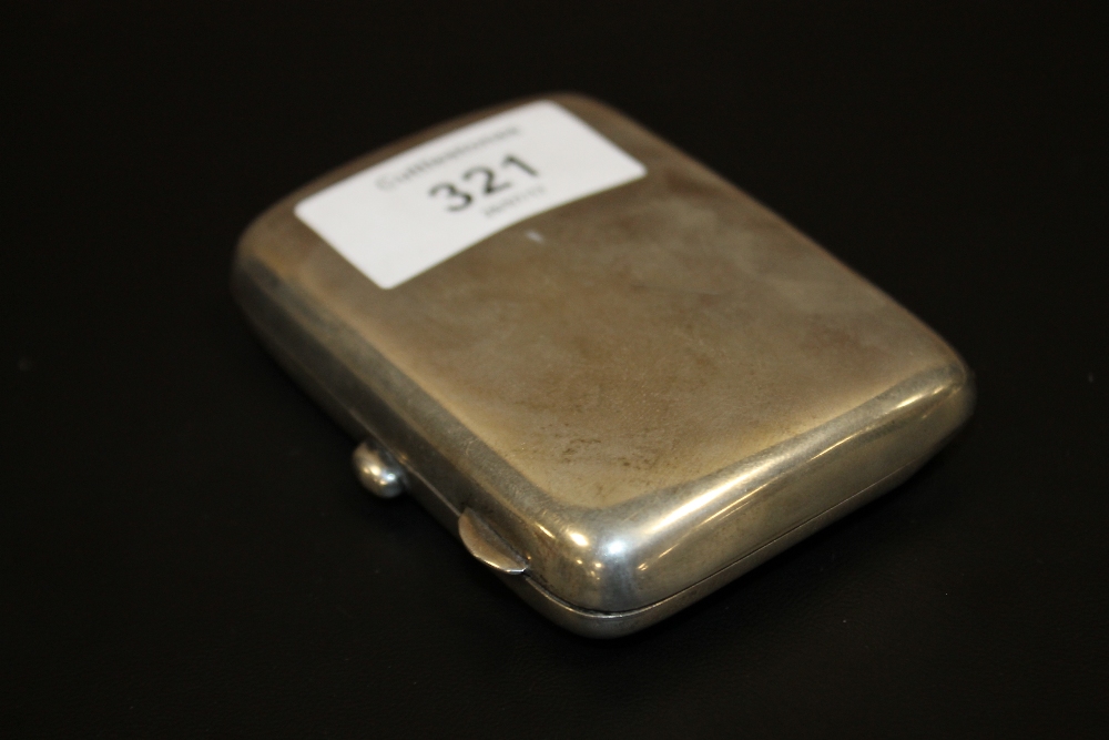 A HALLMARKED SILVER CIGARETTE CASE