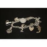 A SILVER CHARM BRACELET