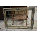 A LARGE VINTAGE GILT PICTURE FRAME