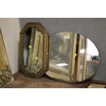 AN OVAL WALL HANGING MIRROR TOGETHER WITH A BRASS FRAMED BEVEL EDGED EXAMPLE (2)