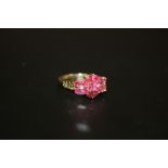 A BOXED 9CT GOLD LADIES DRESS RING SET WITH PINK STONES