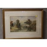 A SIGNED FRAMED AND GLAZED G. BUCKLEY WATERCOLOUR DEPICTING A RIVER SCENE