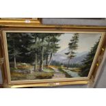 A LARGE GILT FRAMED OIL ON CANVAS DEPICTING A COUNTRY SCENE SIGNED LOWER LEFT
