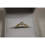 AN 18CT GOLD SOLITAIRE DIAMOND RING