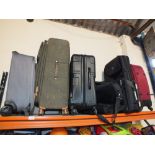 SIX ASSORTED SUITCASES AND ANOTHER