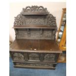 A LARGE 19TH CENTURY CARVED OAK BUFFET